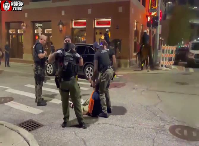Video :A police officer is shown on camera beating a guy forcefully